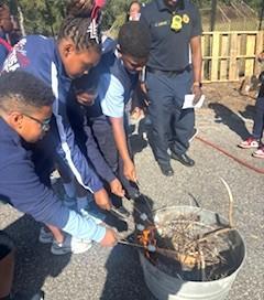 TMSA Students Learn, Burn & Enjoy S’mores in Fiery Agriculture Lesson Featured Photo