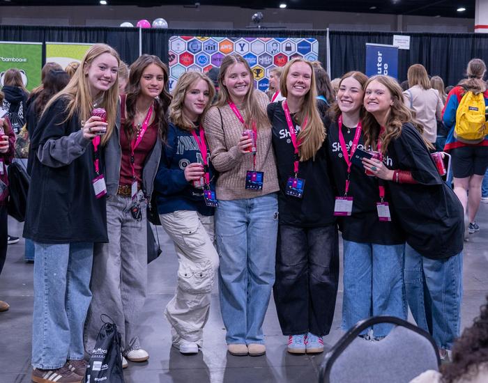 group of students smiling at camera