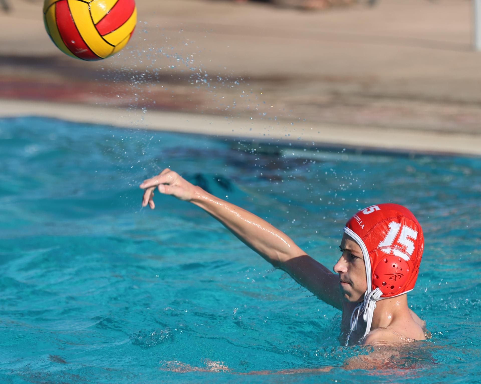 Boys playing water polo against Yosemite
