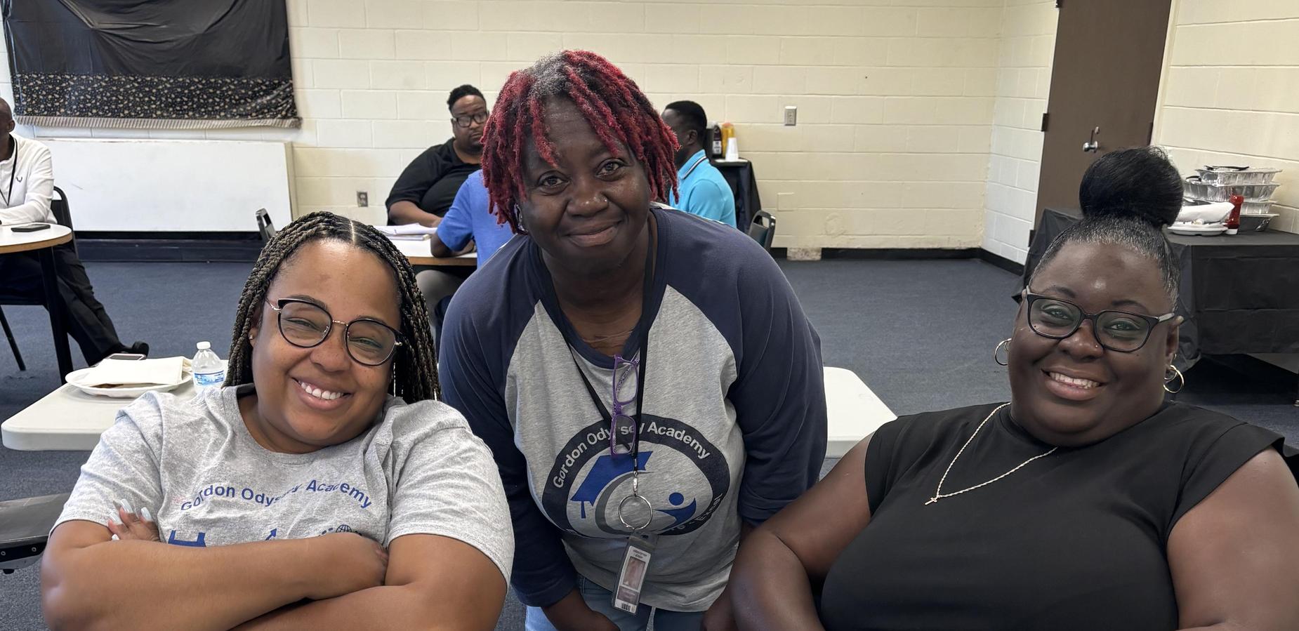 Asia Cooper, Felica Durham, and Barbara Williamson-Holley staff return