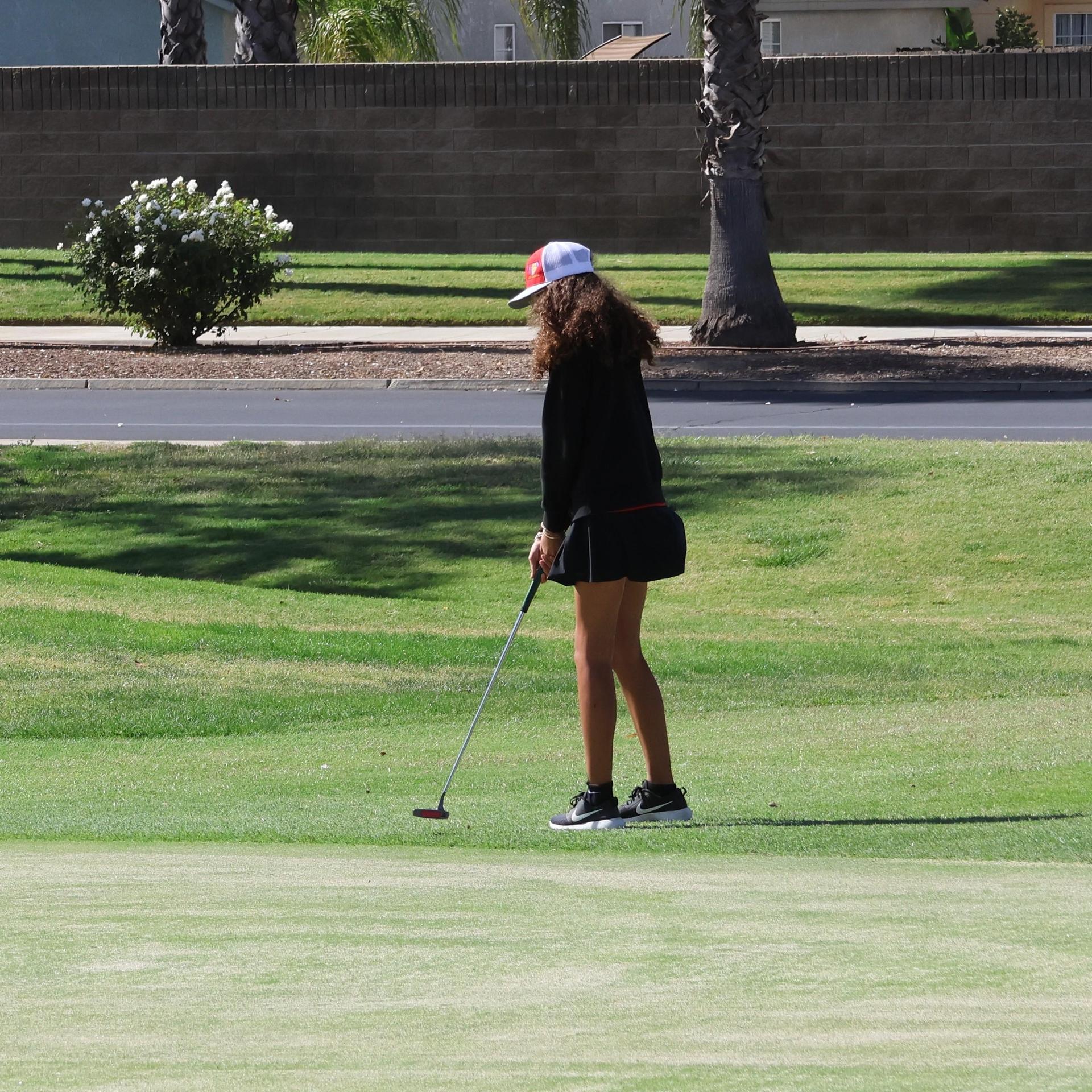 Girls golfers in action at the championships