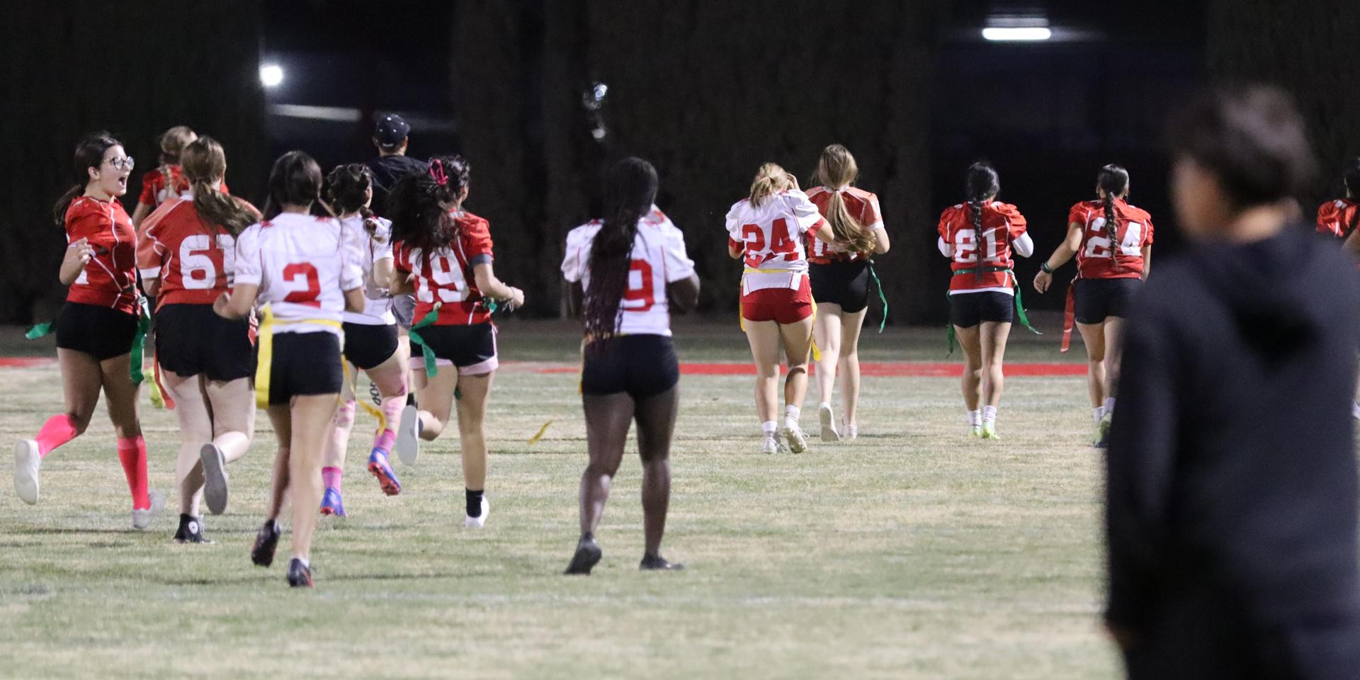 girls playing flag football
