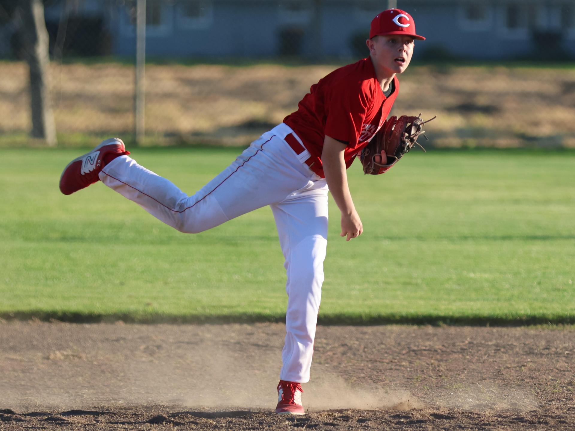 junior varsity baseball players in action