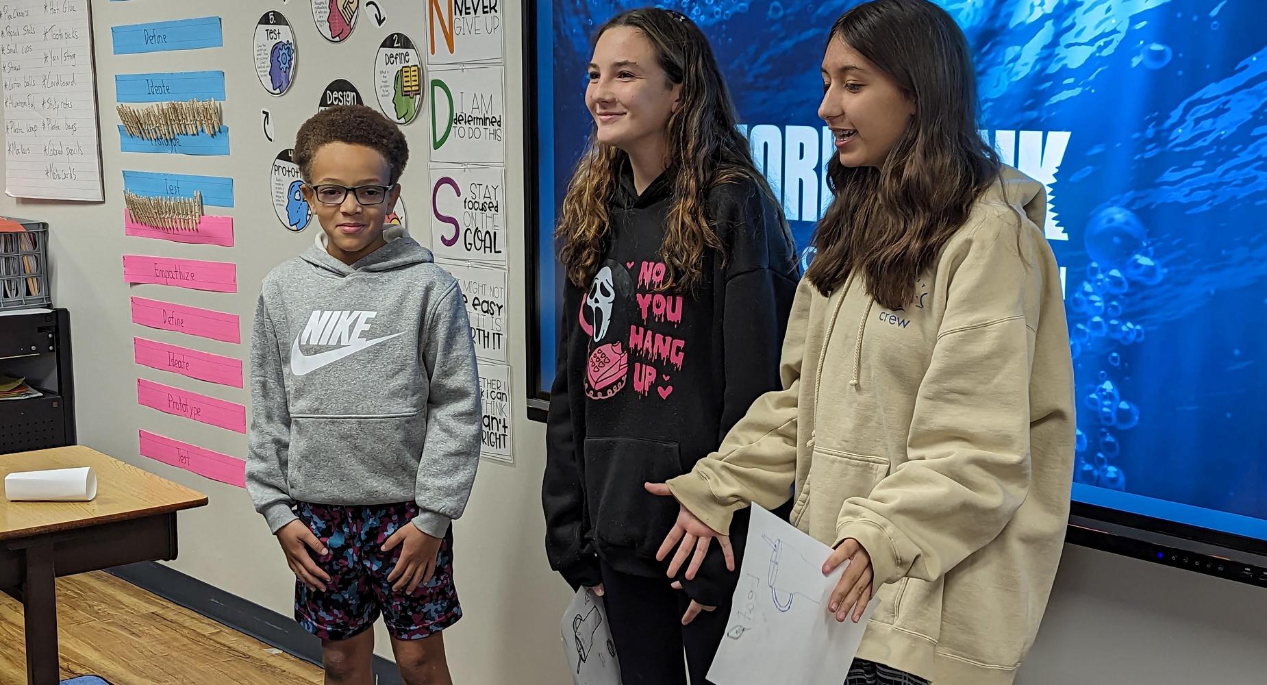 Students making a Shark Tank presentation