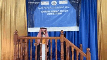 a cartoon girl wearing a red scarf and a hijab says assalamu alaikum