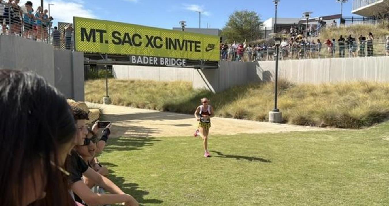 Runner approaching the finish line at the Mt. SAC XC Invite event.