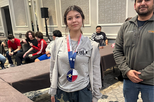 Isabelle Gutierrez and her individual chess medal