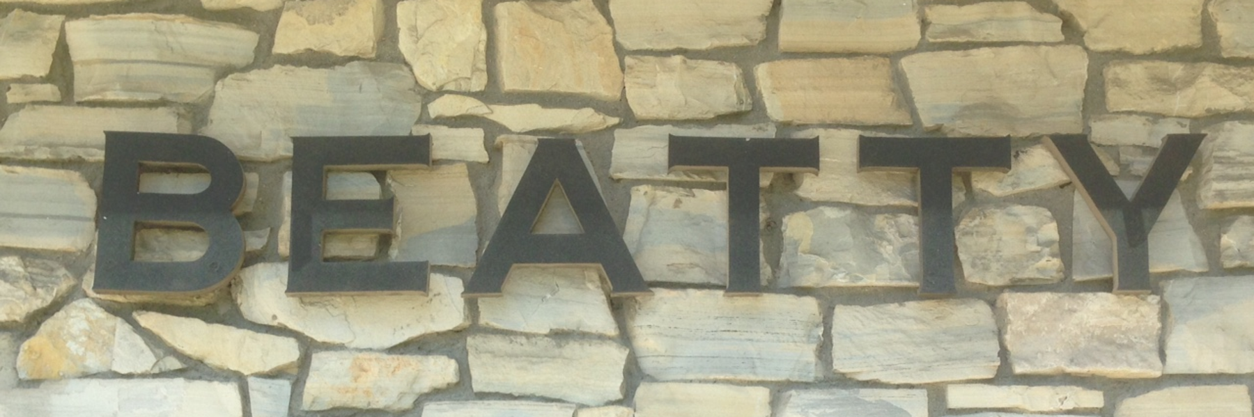 Image of the original Beatty metal signage