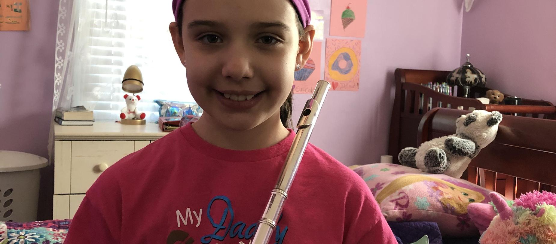 student with her flute