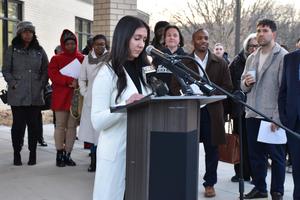 Rachel Speaking at podium