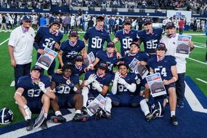 Members of the 2025 Smithson Valley High School football team with championship medals