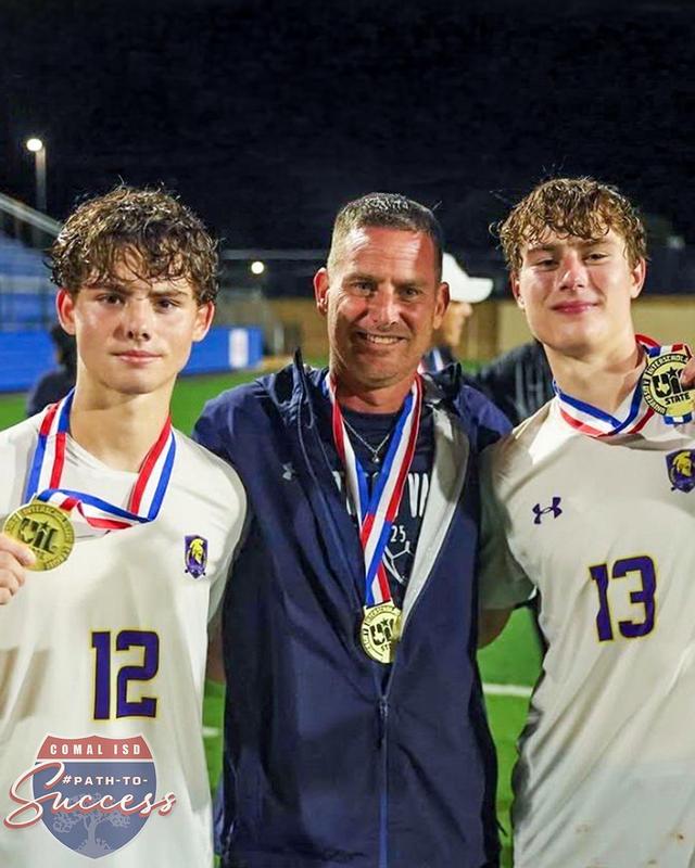 - A family photo of SV Coach Jason Adkins with his sons Parker and Cooper Adkins after the State Championship.