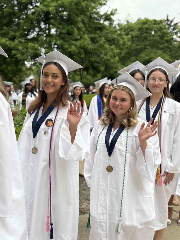 2 students at graduation
