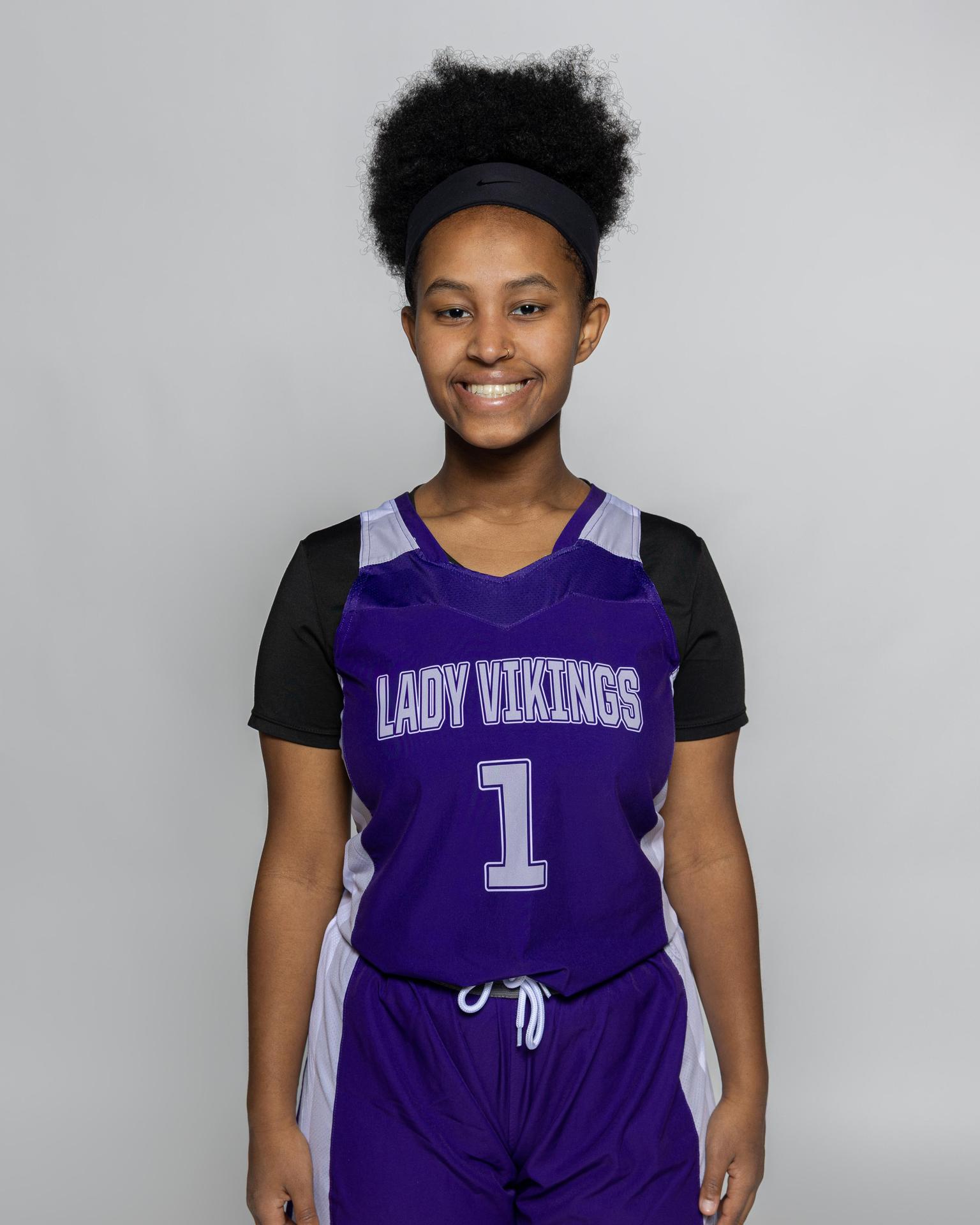 Female player number 1 posting for the roster