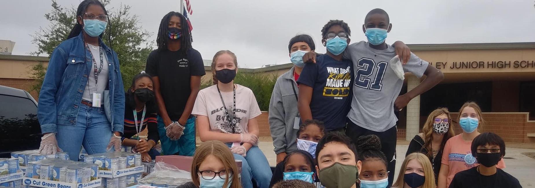 group of students in front of campus