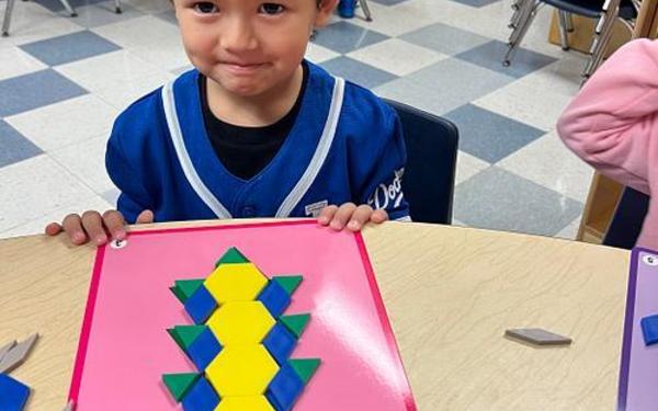 Boy with pattern blocks