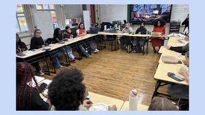 Principal speaking to a classroom.