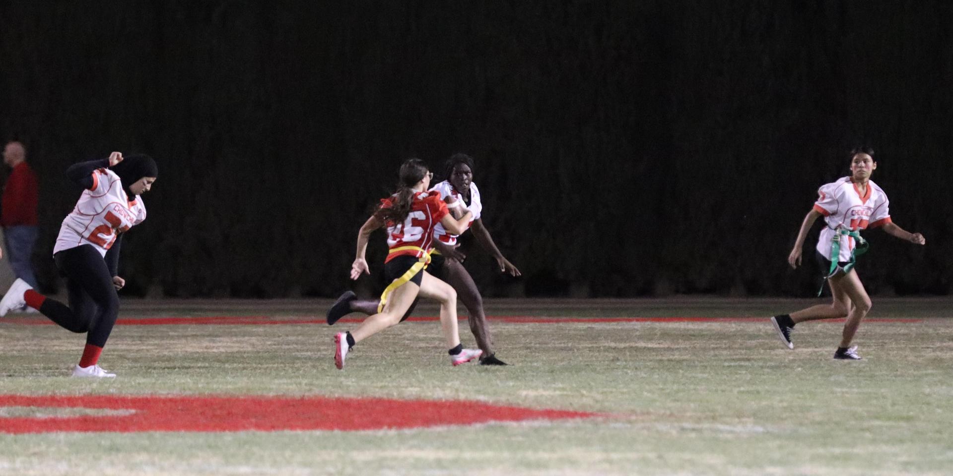 girls playing flag football