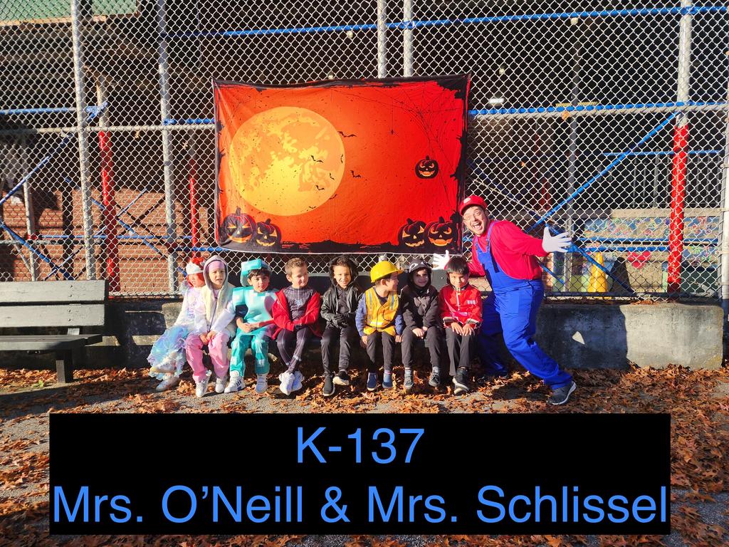 staff and students in halloween costumes