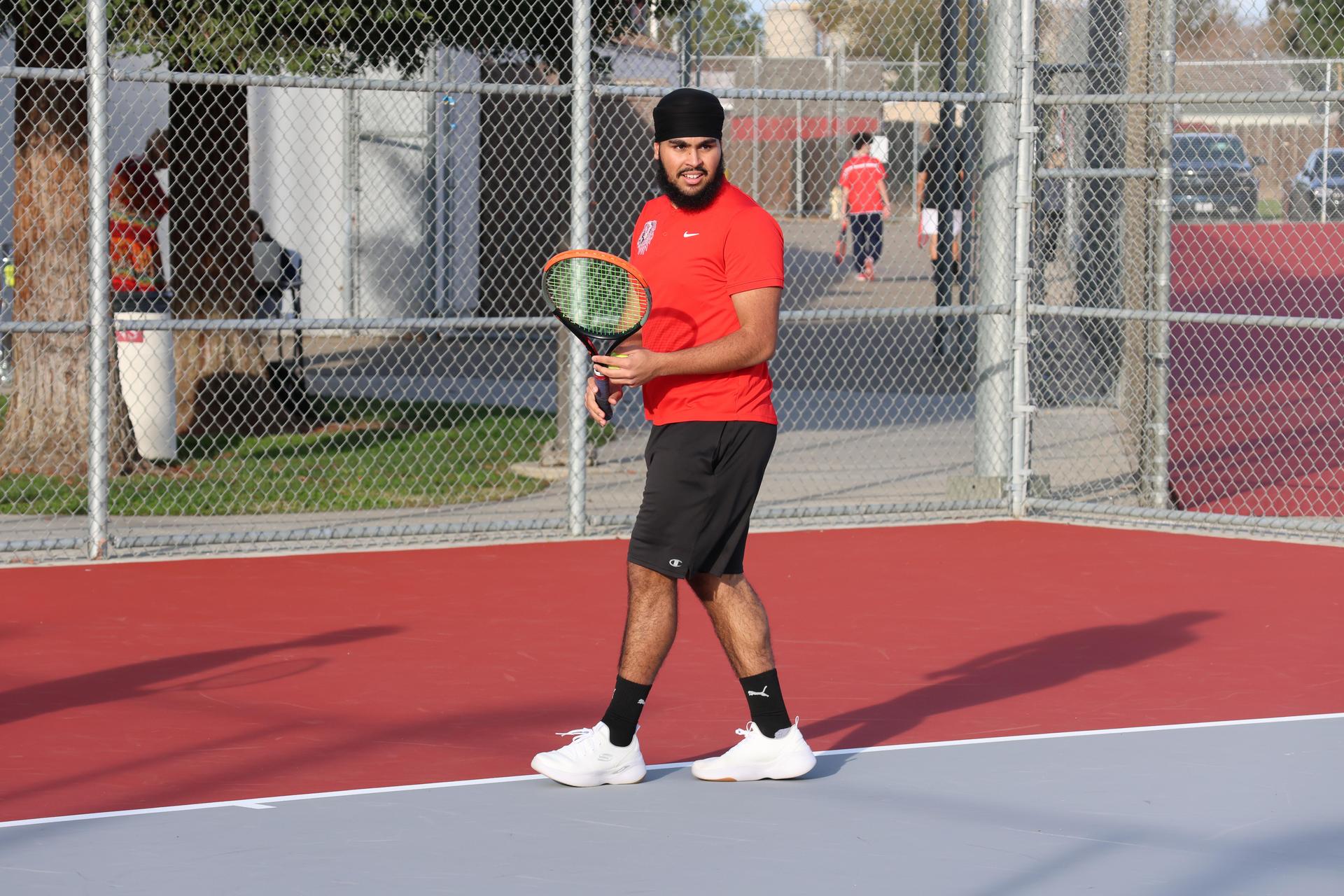 CUHS Boys playing tennis against coalinga
