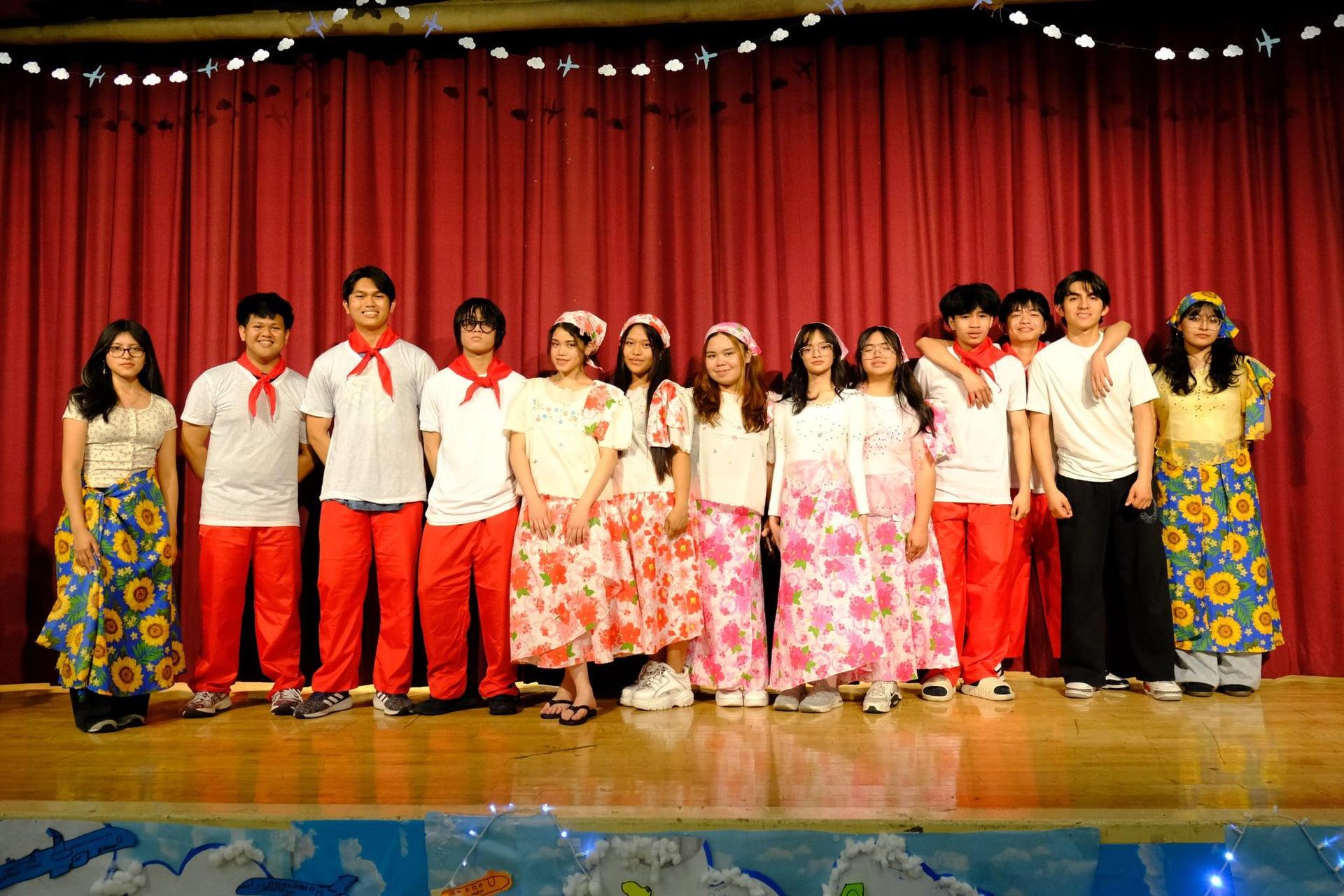 Group picture of Filipino Club members on stage
