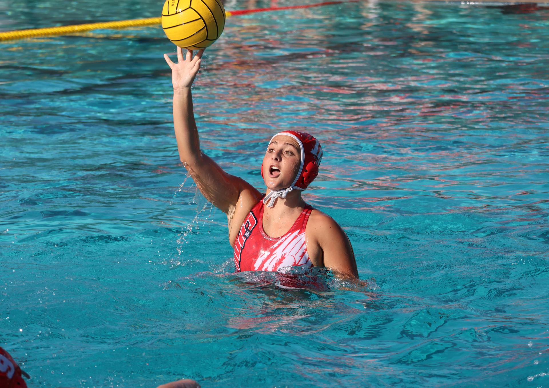 girls playing water polo against Sanger West