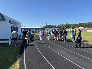 Students walking track