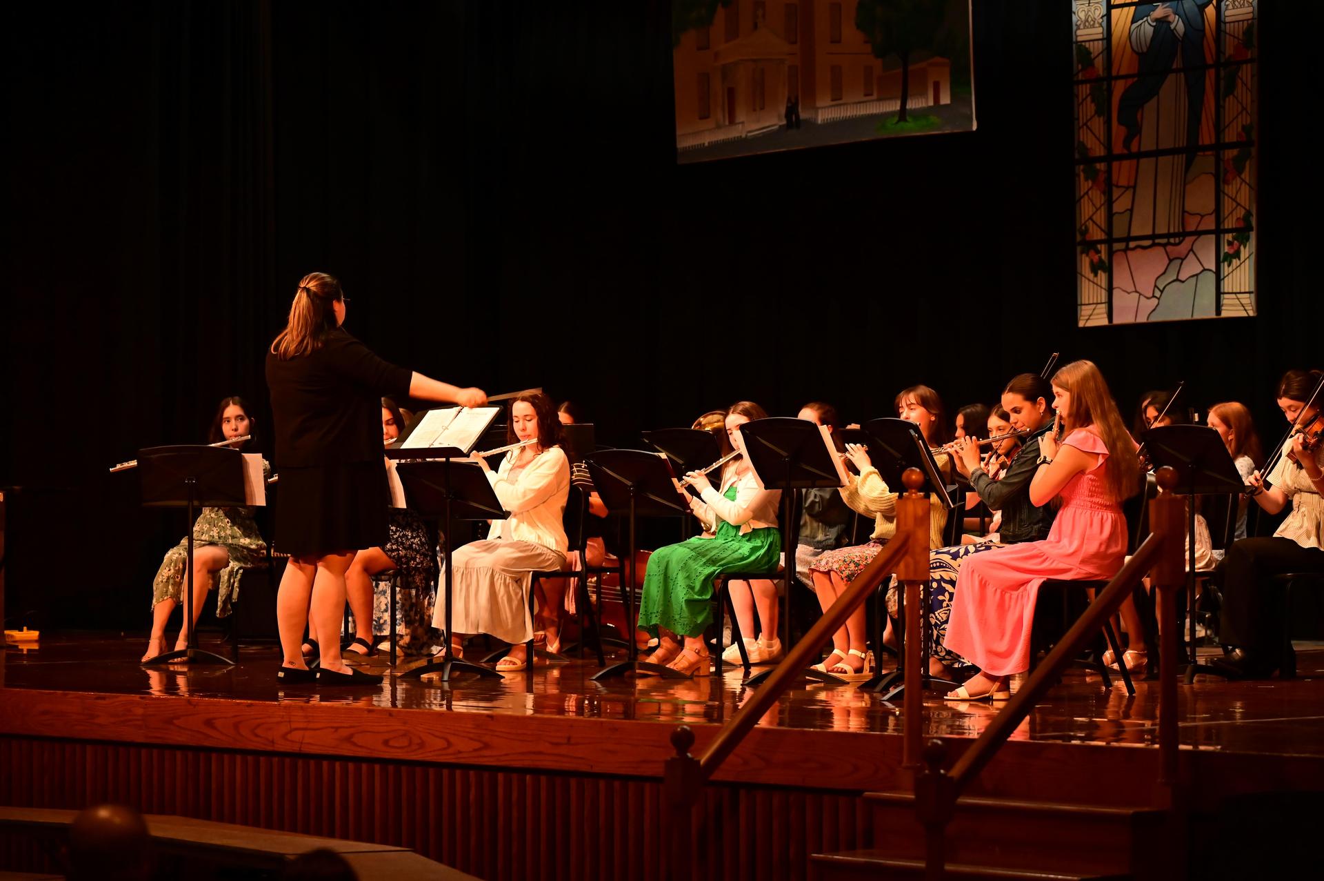 Students Performing At A Mercy Concert