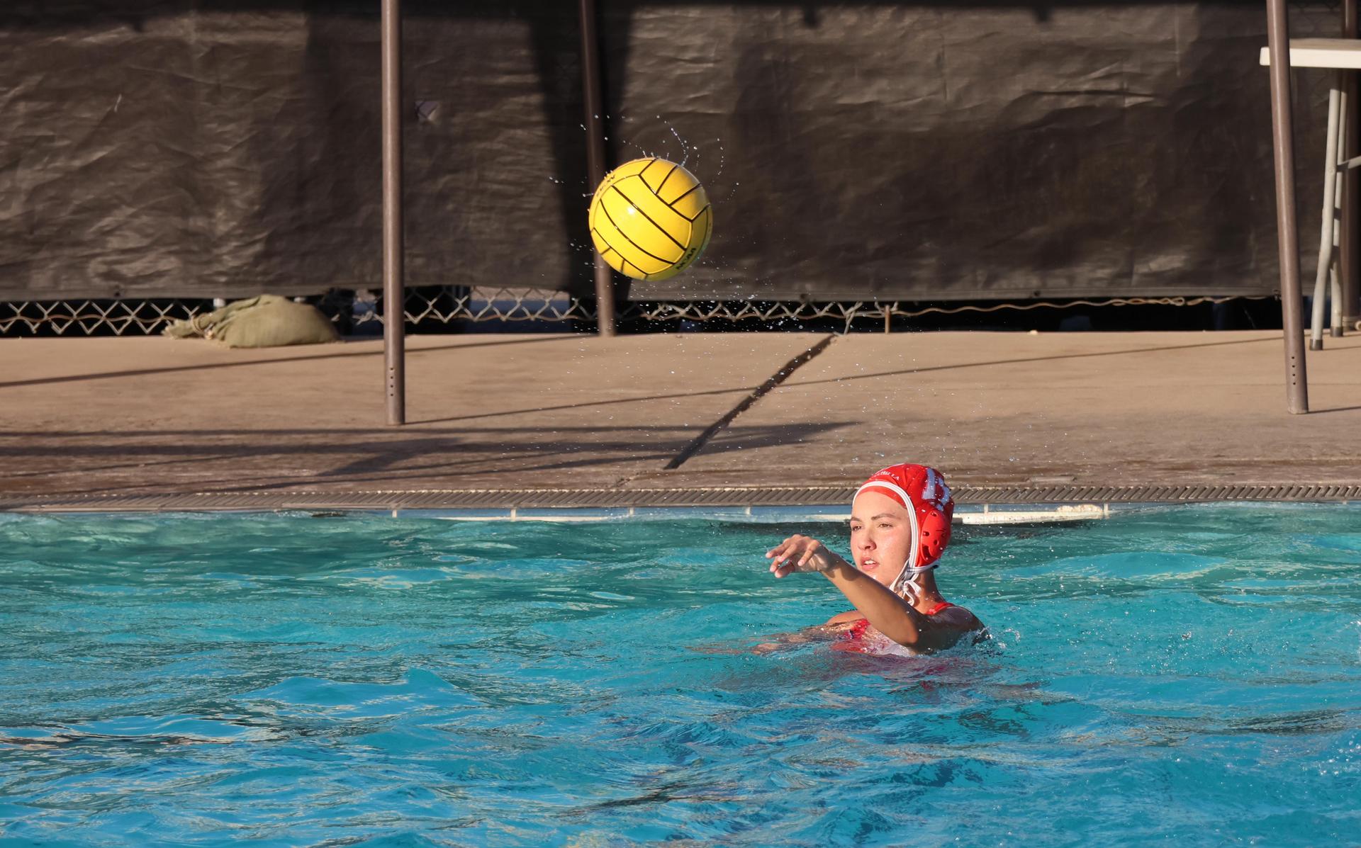 girls playing water polo against Sanger West