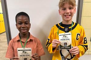 Students Darian Nezianya and Luka Dorosh with their principal lanyards