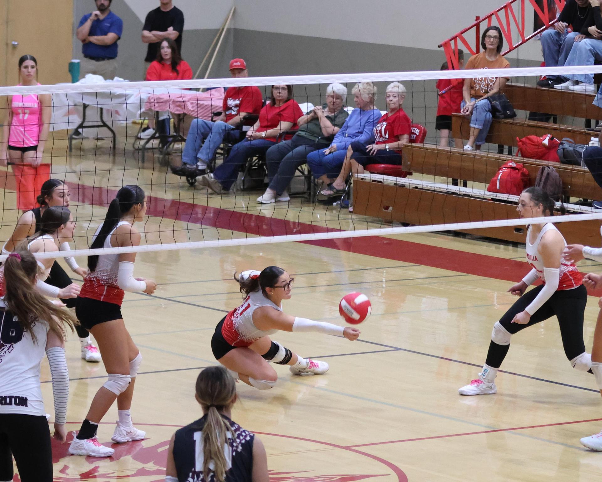 Varsity Volleyball playing vs. Fresno Christian 72