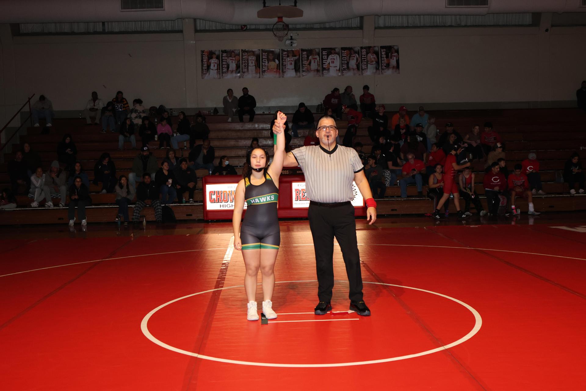 Wrestling winners with hands up 52