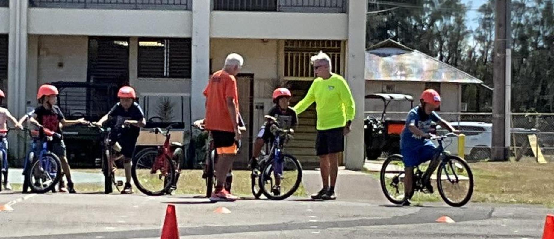 PATH bike education for 4th grade - students practicing on the blacktop