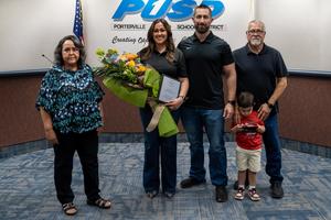 people posing in the governing board room