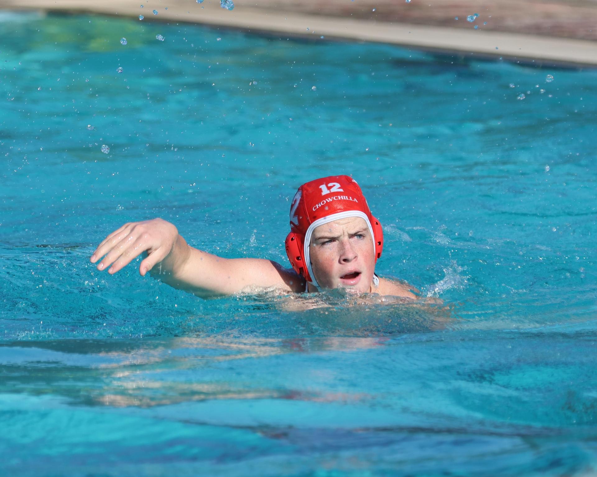 Boys playing water polo against Yosemite