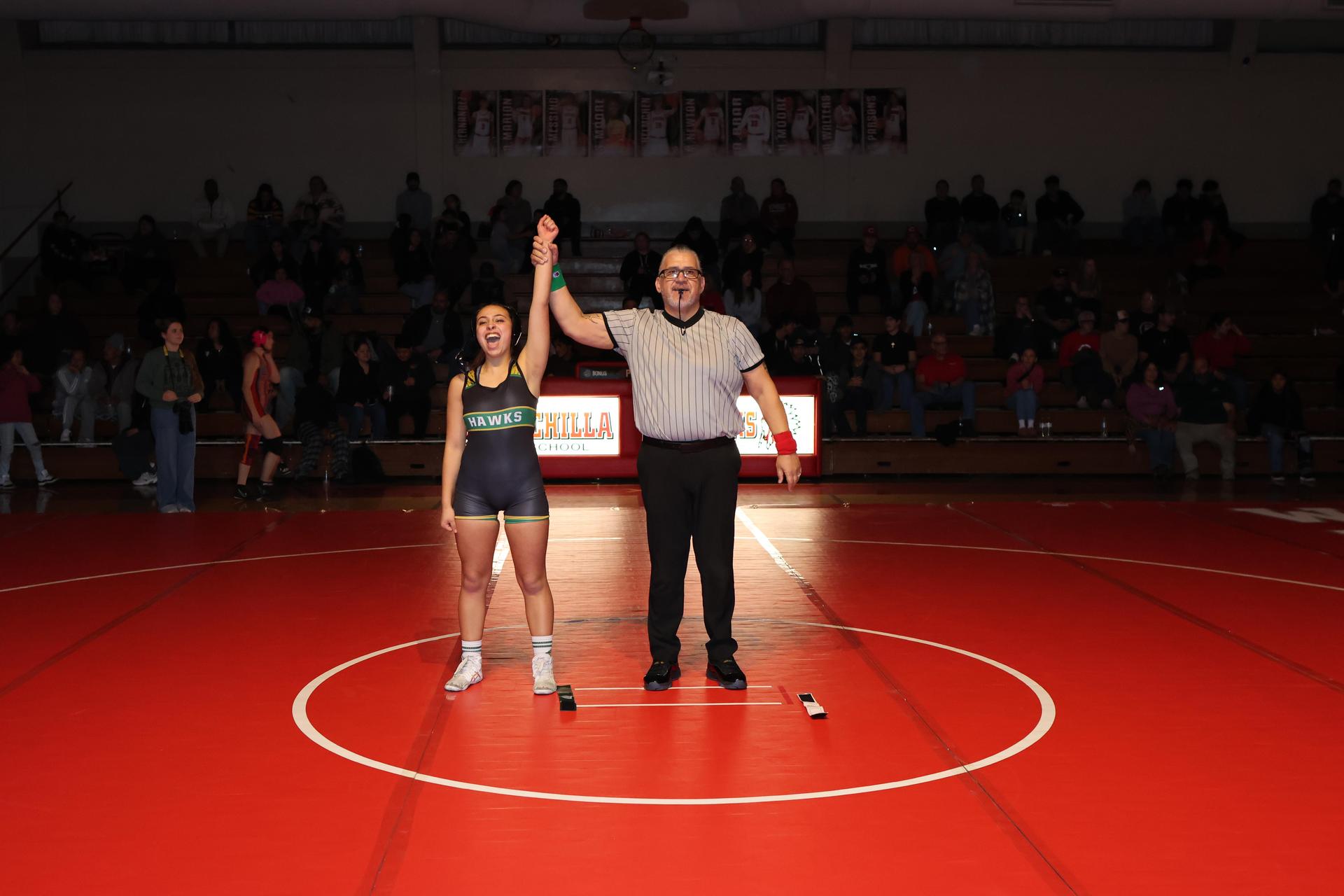 Wrestling winners with hands up 101
