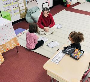 BHS Student sitting with Davis students