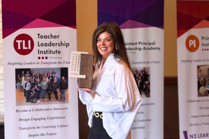Brandy Copeland poses with award