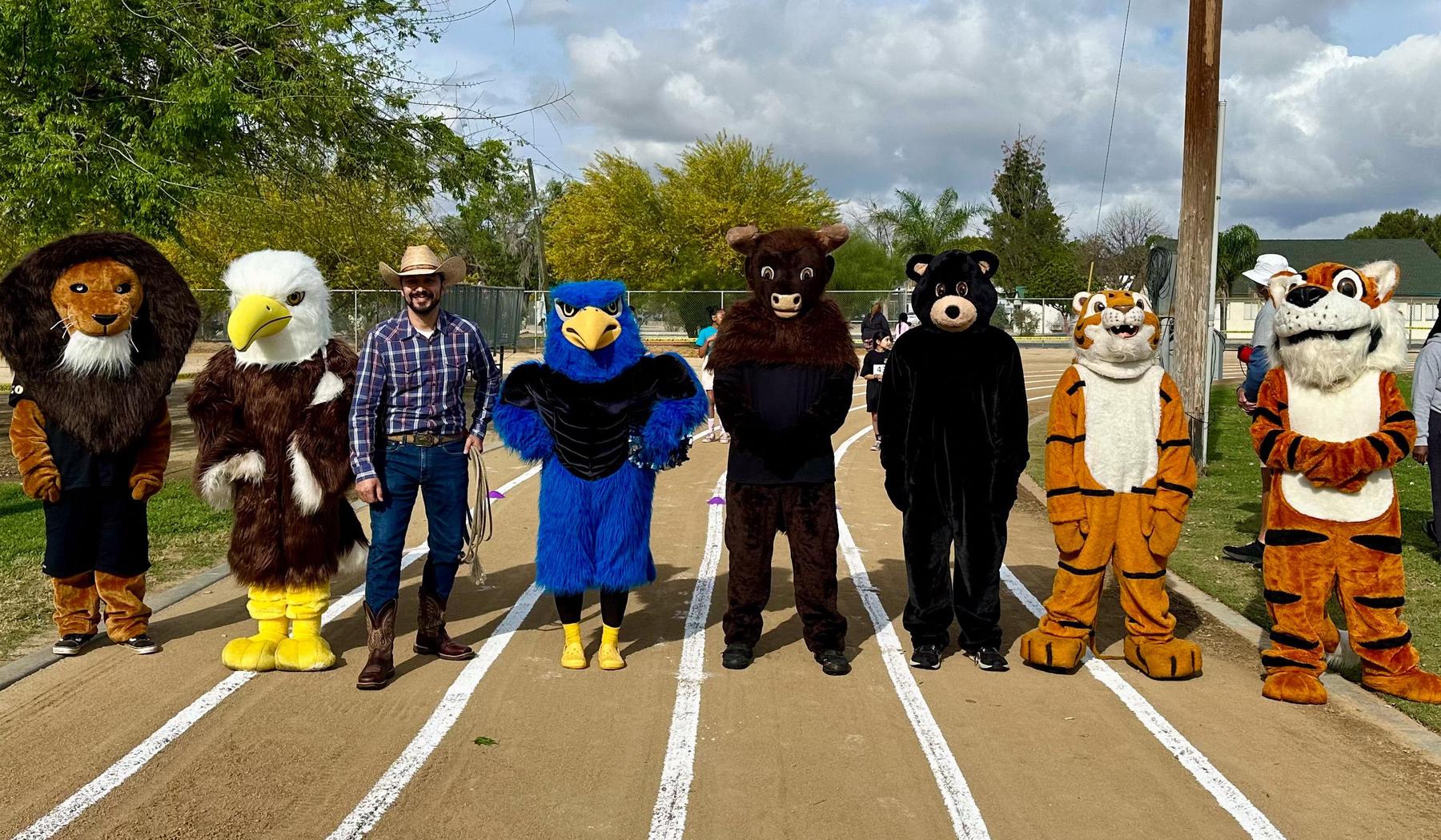 School mascots lined up at the 5th grade track meet