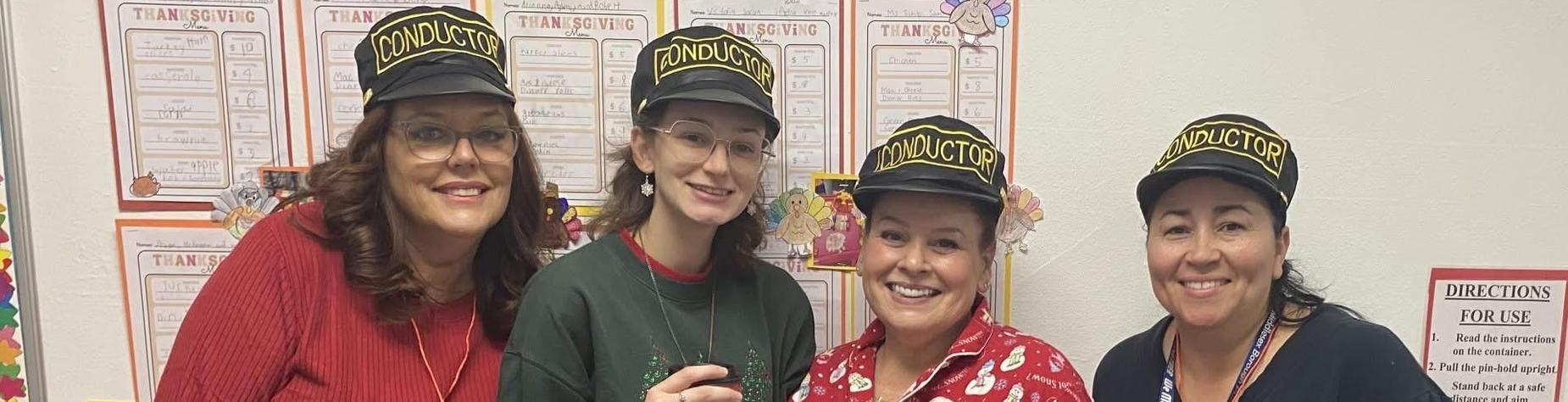 Three people in festive attire holding drinks, posing together with Christmas-themed clothing.