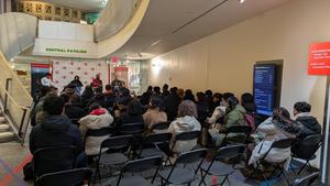 Students attending a panel discussion on game development