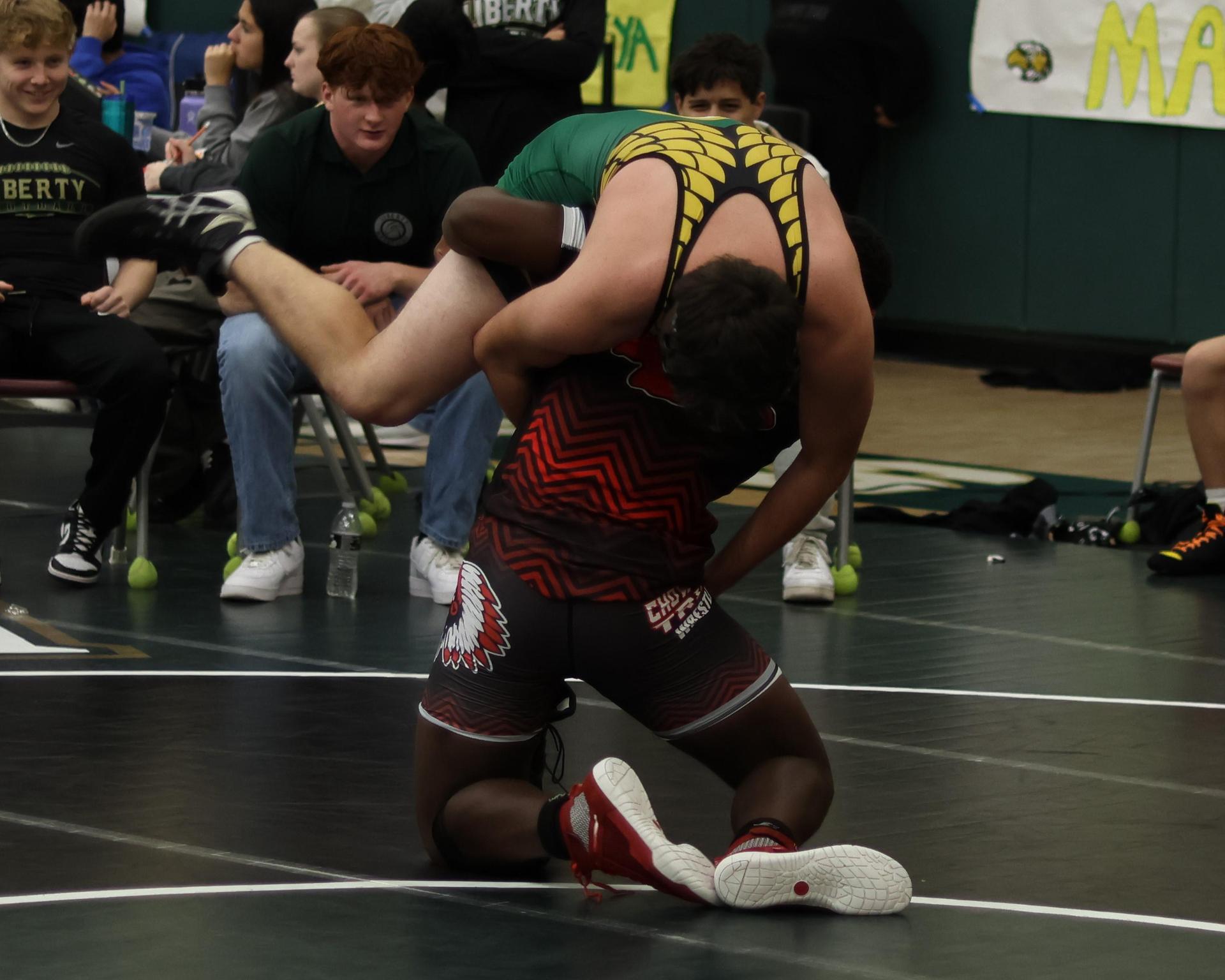 boys wrestling at liberty duals