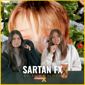 Image of two students with microphones