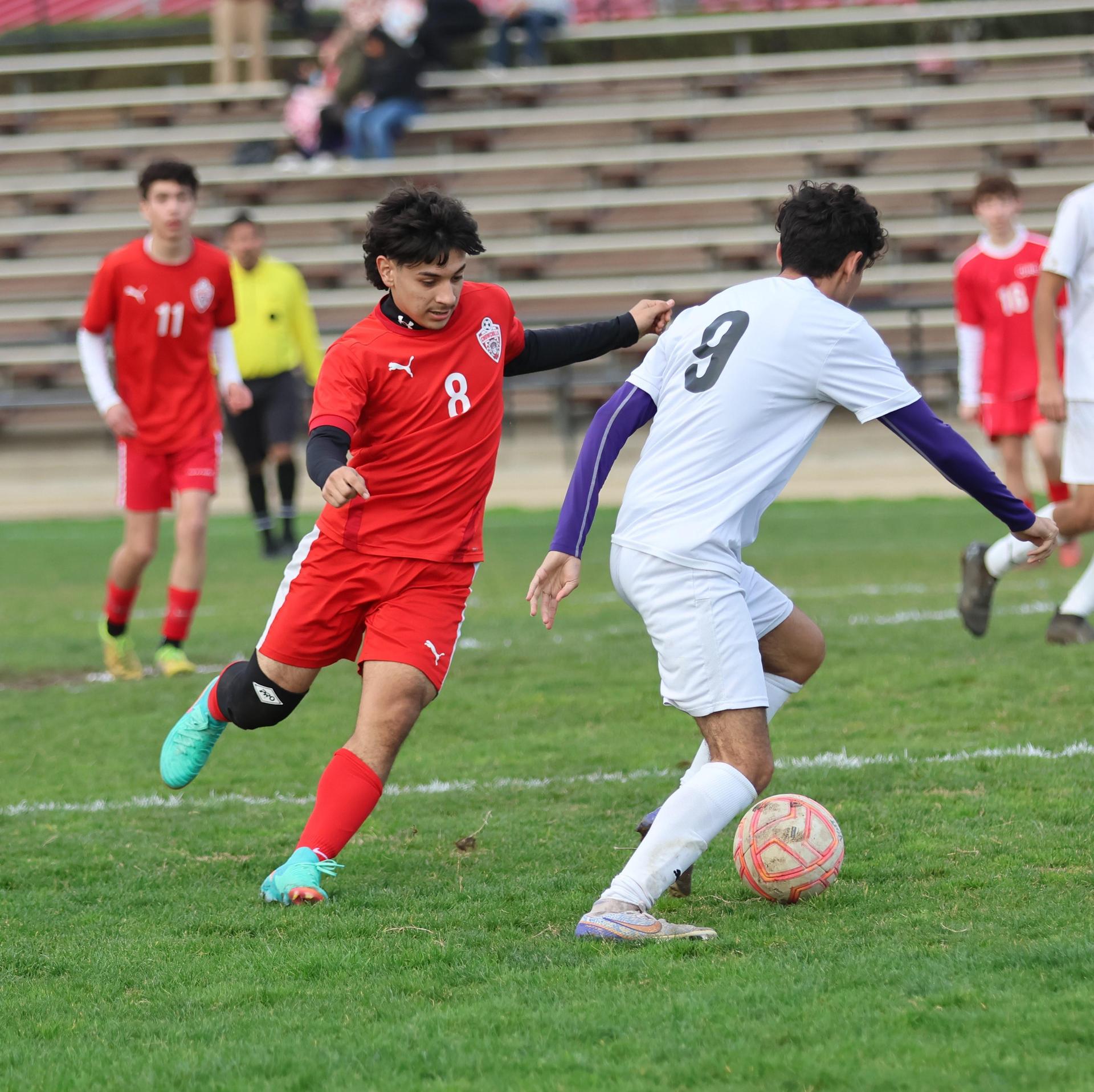 junior varsity boys playing soccer against washington union