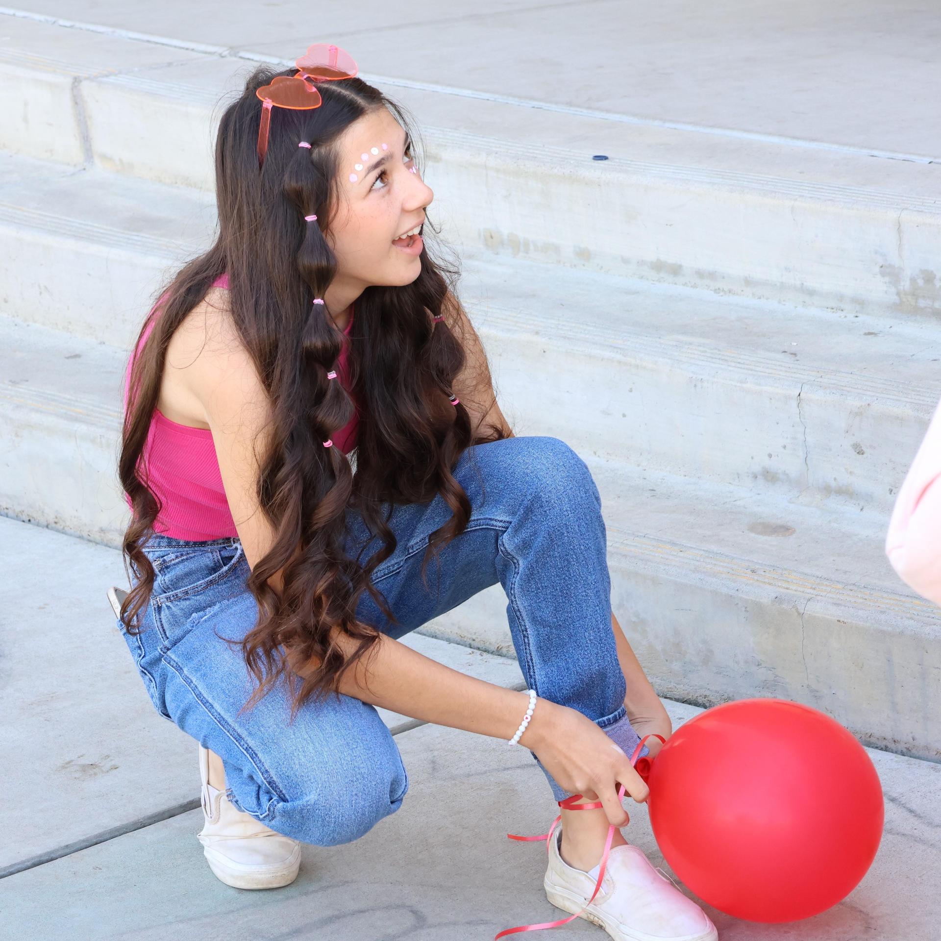 students dressed in pink to show school spirit