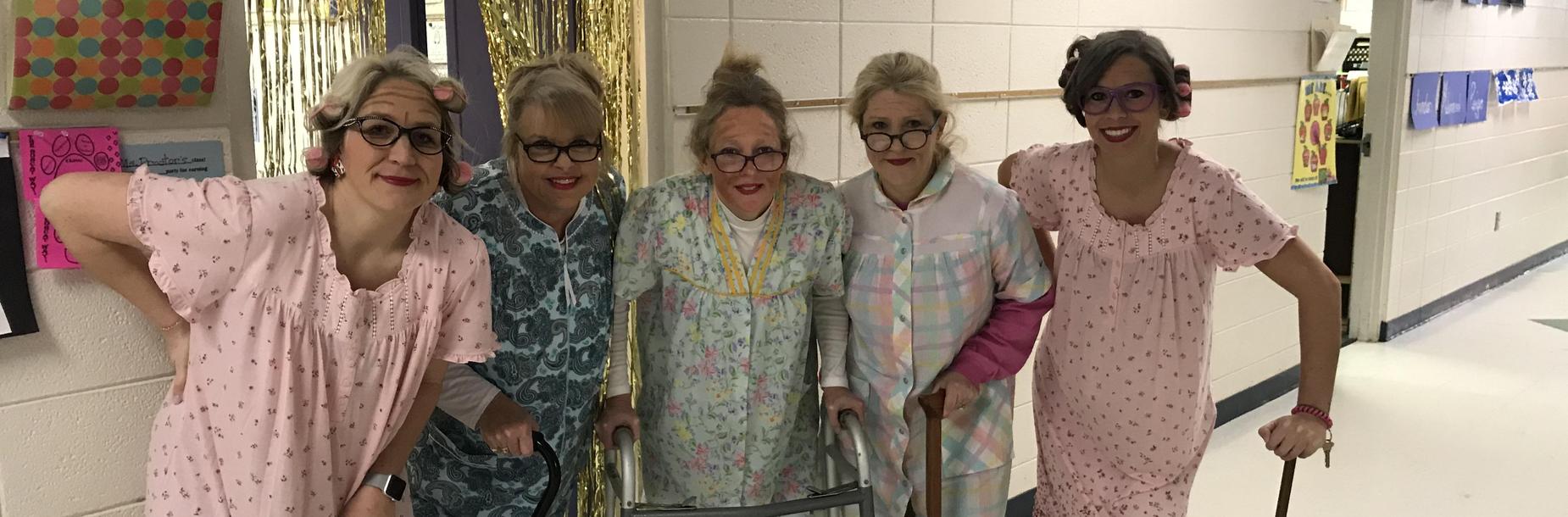 Teachers posed for picture dressed up as the elderly in celebration of 100 days of school