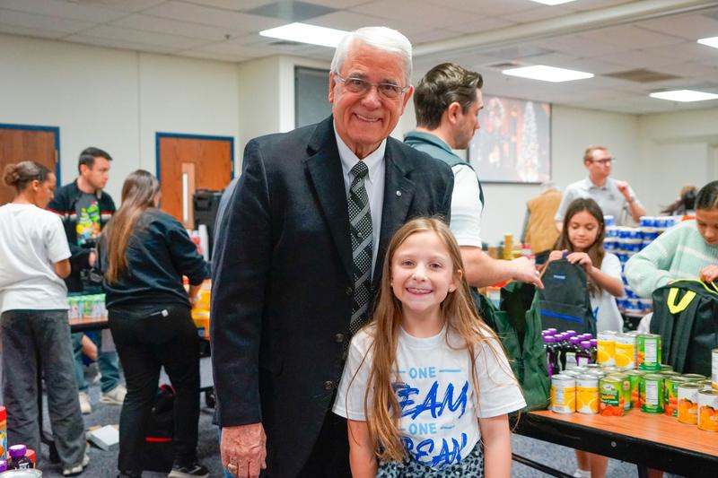 Willow Bend student and community volunteer pose for a photo