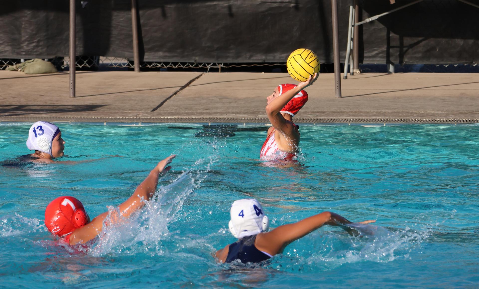 girls playing water polo against Sanger West