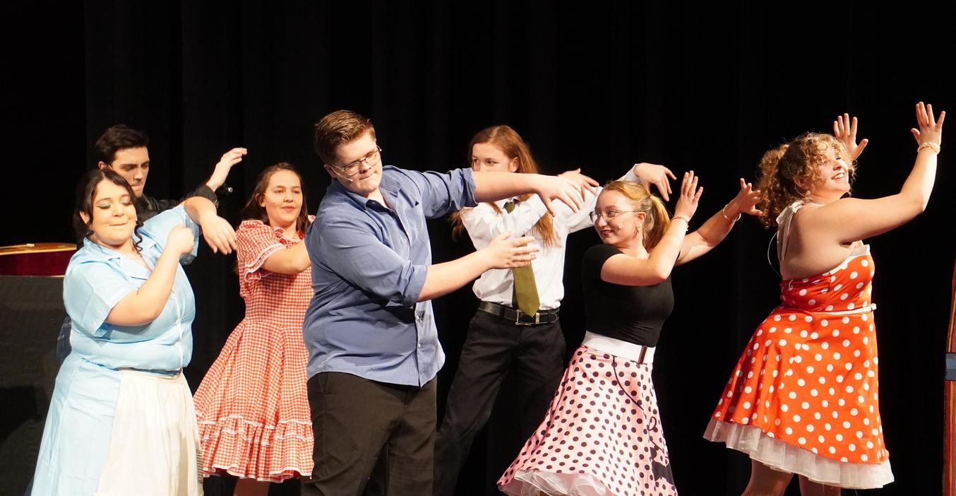 Students dance in the spring musical.