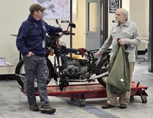 Kevin Cameron talks with Aviation Maintenance Technology instructor Mike McIntyre